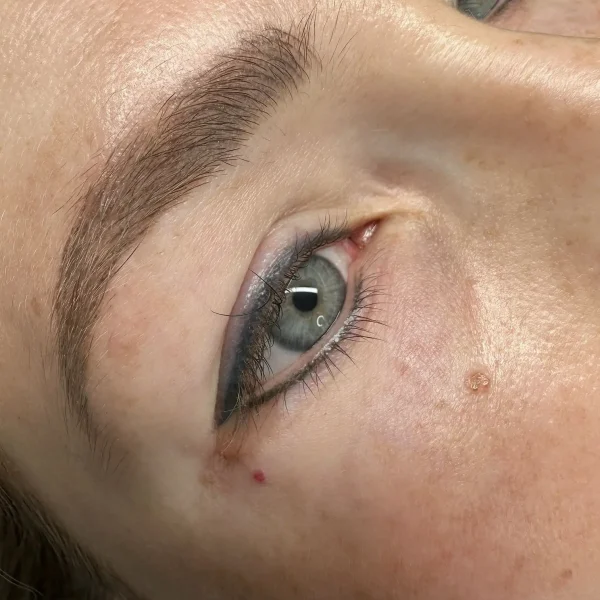 eyebrow feathering tattoo